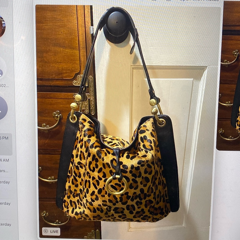 BCBG MAXAZRIA LEOPARD AND BLACK LEATHER PURSE.